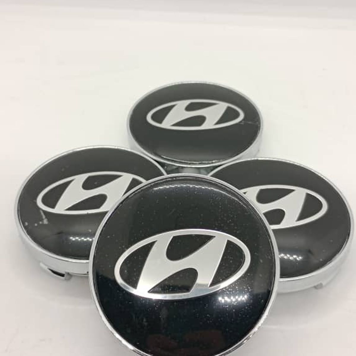 GENERICO - Set X4 Tapas centro Llantas autos 56mm hyundai negro plata