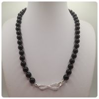 Collar + aros de perlas Swarovski  con broche de plata y circones.