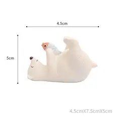 BILBOLA - Oso polar de espalda con pescado