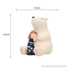 BILBOLA - Niña gata abrazando oso polar