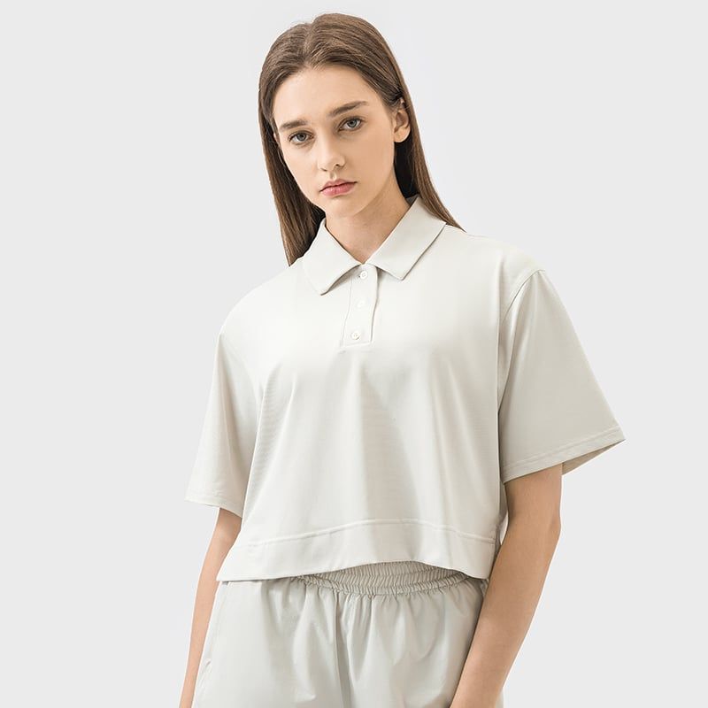 RURUTOTO - Polera Pique Manga Corta Mujer Negro_.