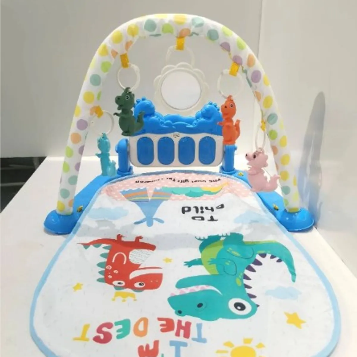 GENERICO - GIMNASIO MUSICAL O ALFOMBRA PARA BEBE DINOSAURIO AZUL