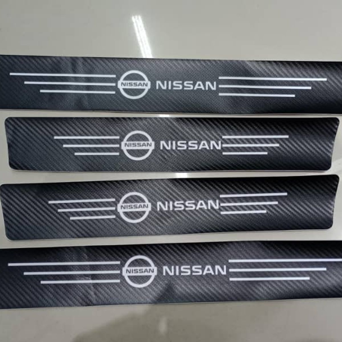 GENERICO - Cubre socalo pisaderas pegatina fibra de carbono nissan