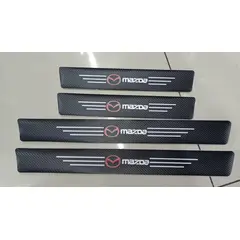 GENERICO - Cubre socalo pisaderas pegatina fibra carbono mazda