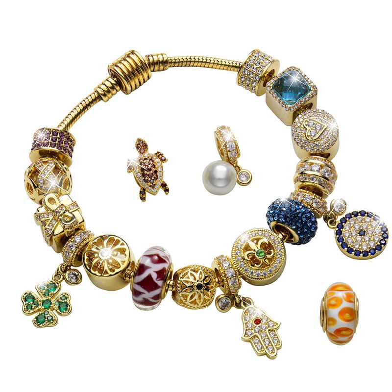 SWISS NATURE LABS - Pulsera con 18 accesorios de oro