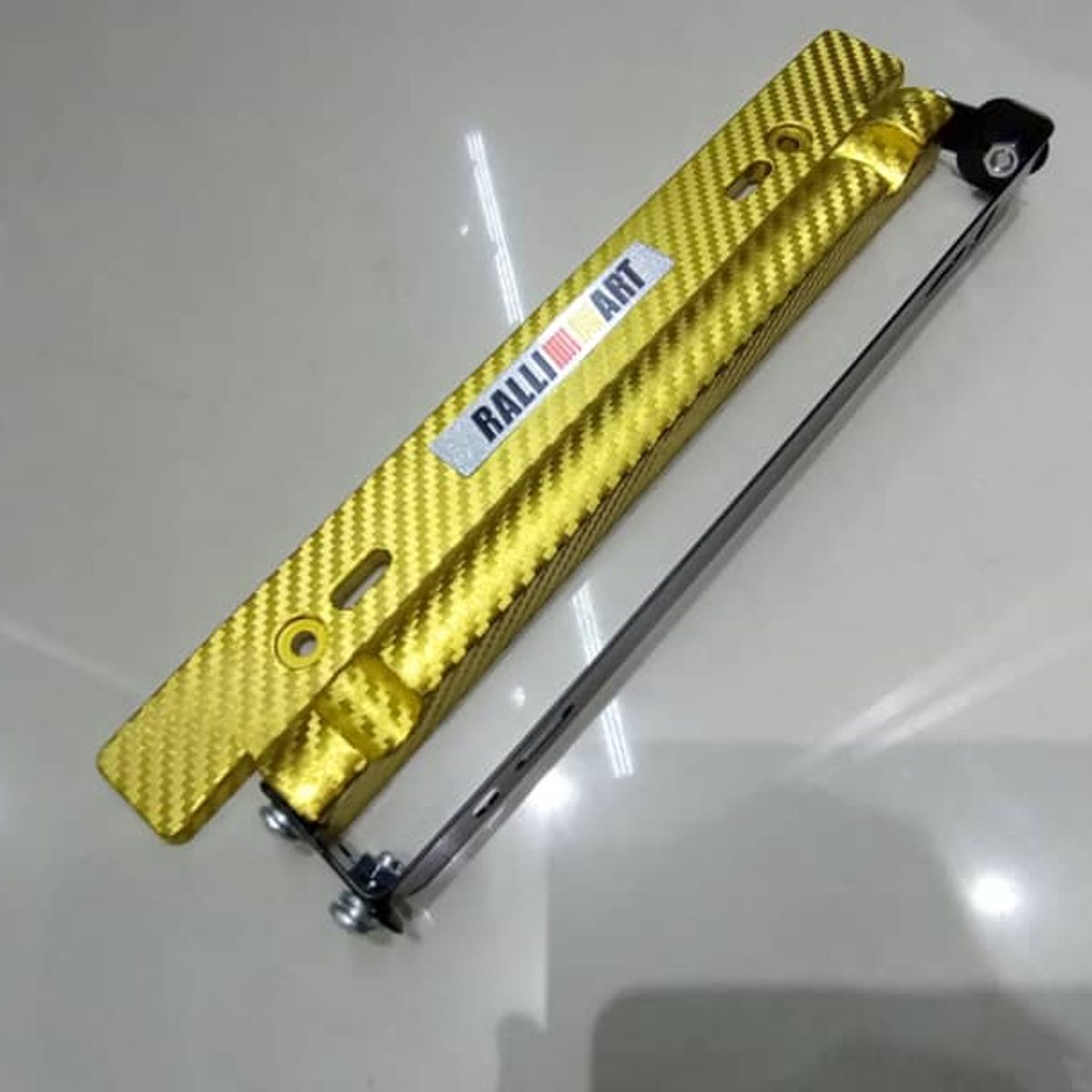 GENERICO - X1 Porta placa auto tipo fibra carbono dorado ralli art