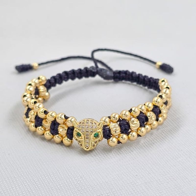 GENERICO - Pulsera Jaguar Tejida Negra Balin Oro Laminado 18k
