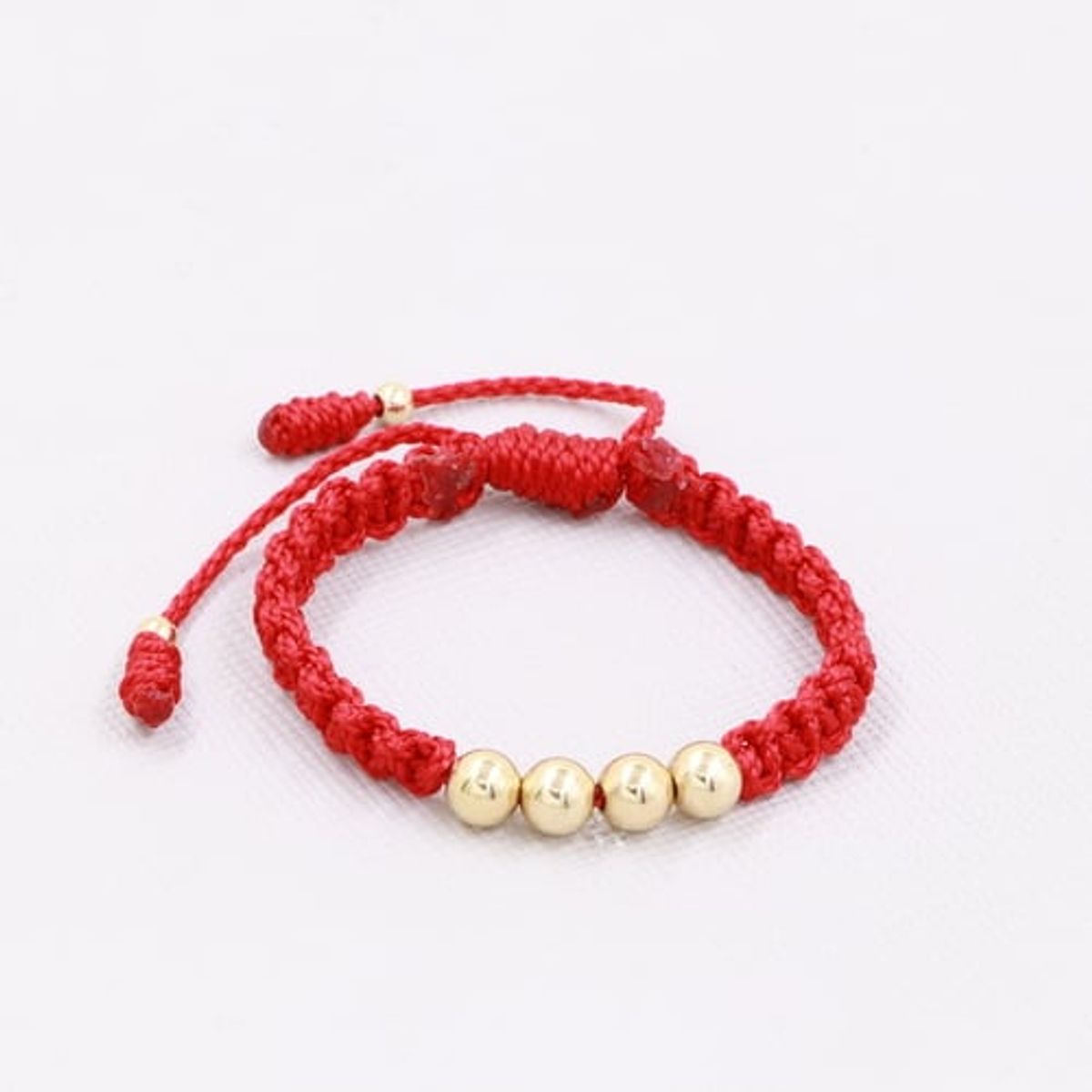 GENERICO - Pulsera Tejida Rojo Bebe  Balin Oro Laminado 18k