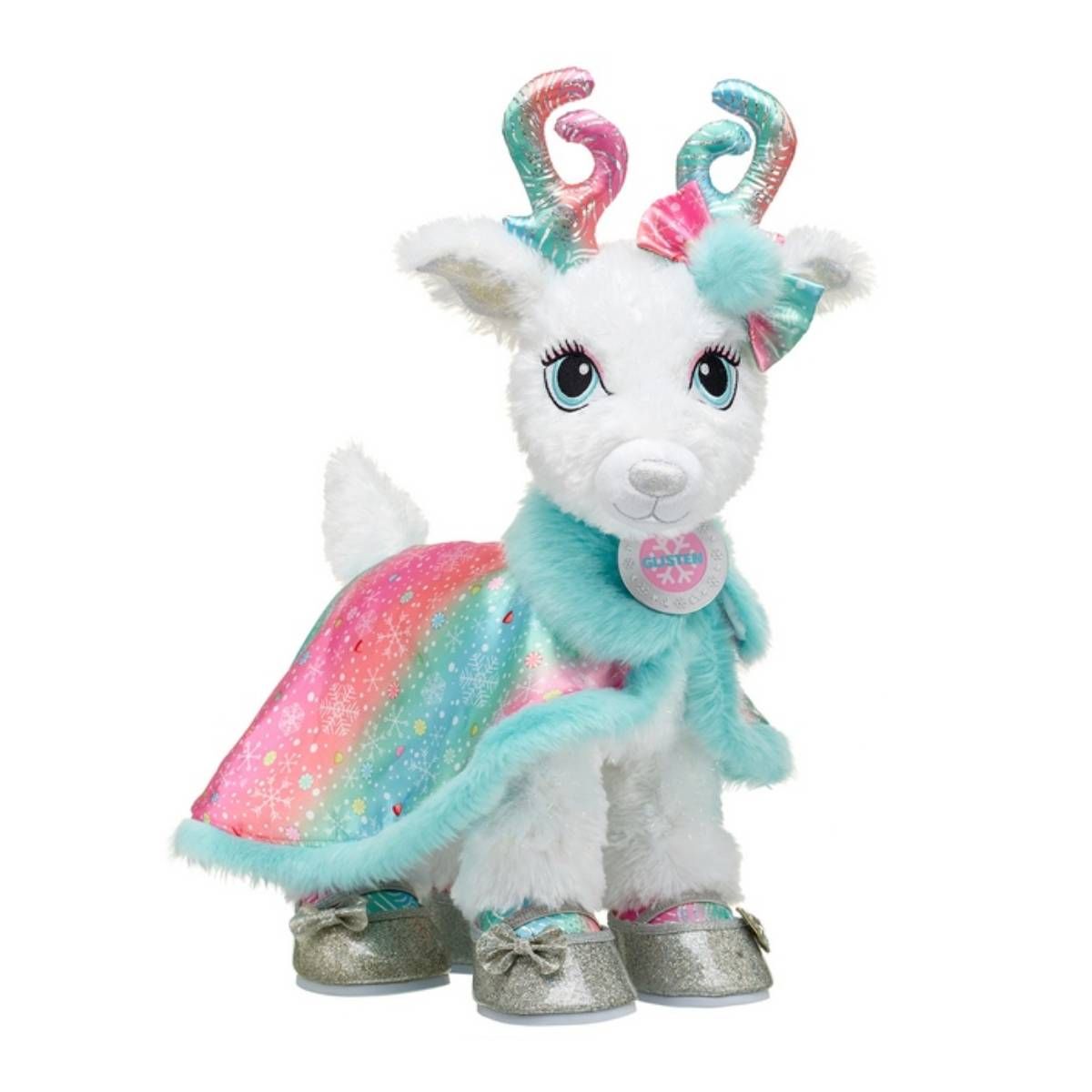 BUILD A BEAR - Capa Build a Bear diseño copos de nieve y moño