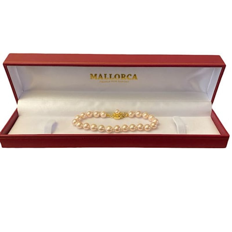 MALLORCA - PULSERA PERLAS DE MALLORCA  6MM. DE DIÁMETRO CON  BROCHE FLOR DORADO.