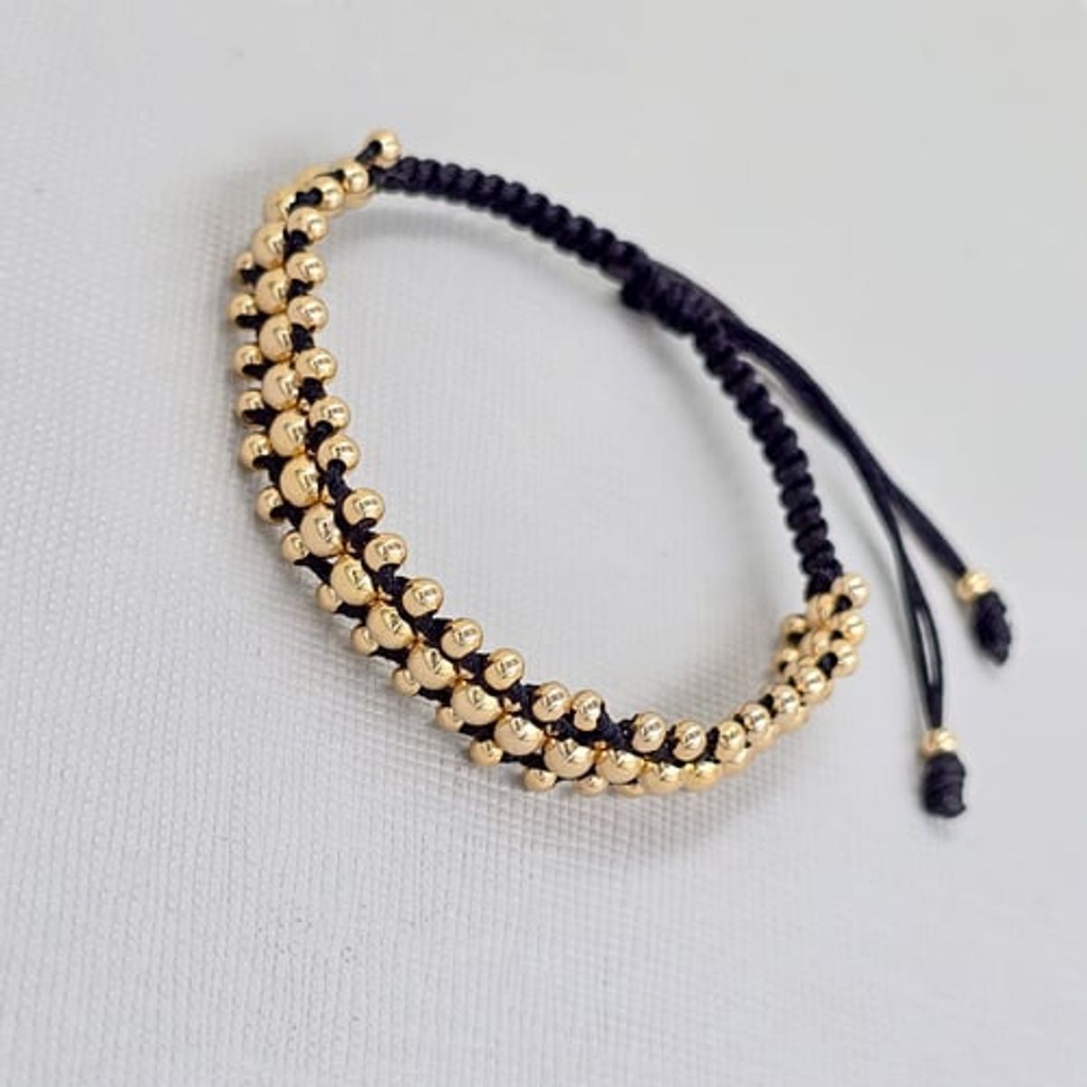 GENERICO - Pulsera Tejida Negra Balin Oro Laminado 18k