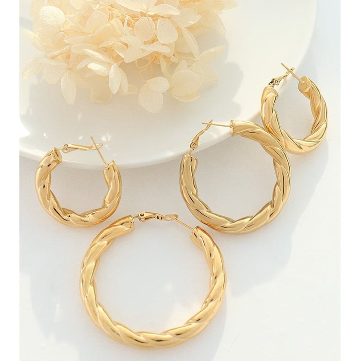 LUX JOYAS - Aros Baño Oro Amarillo 18k Enroscados S