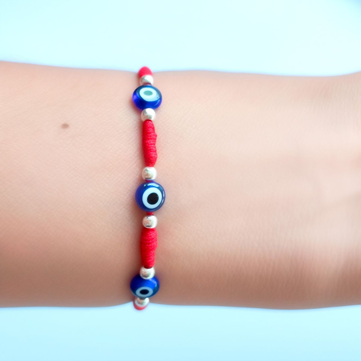 COGGIOLA - Pulsera Ojos Turcos Cordón Rojo Plata Fina 925