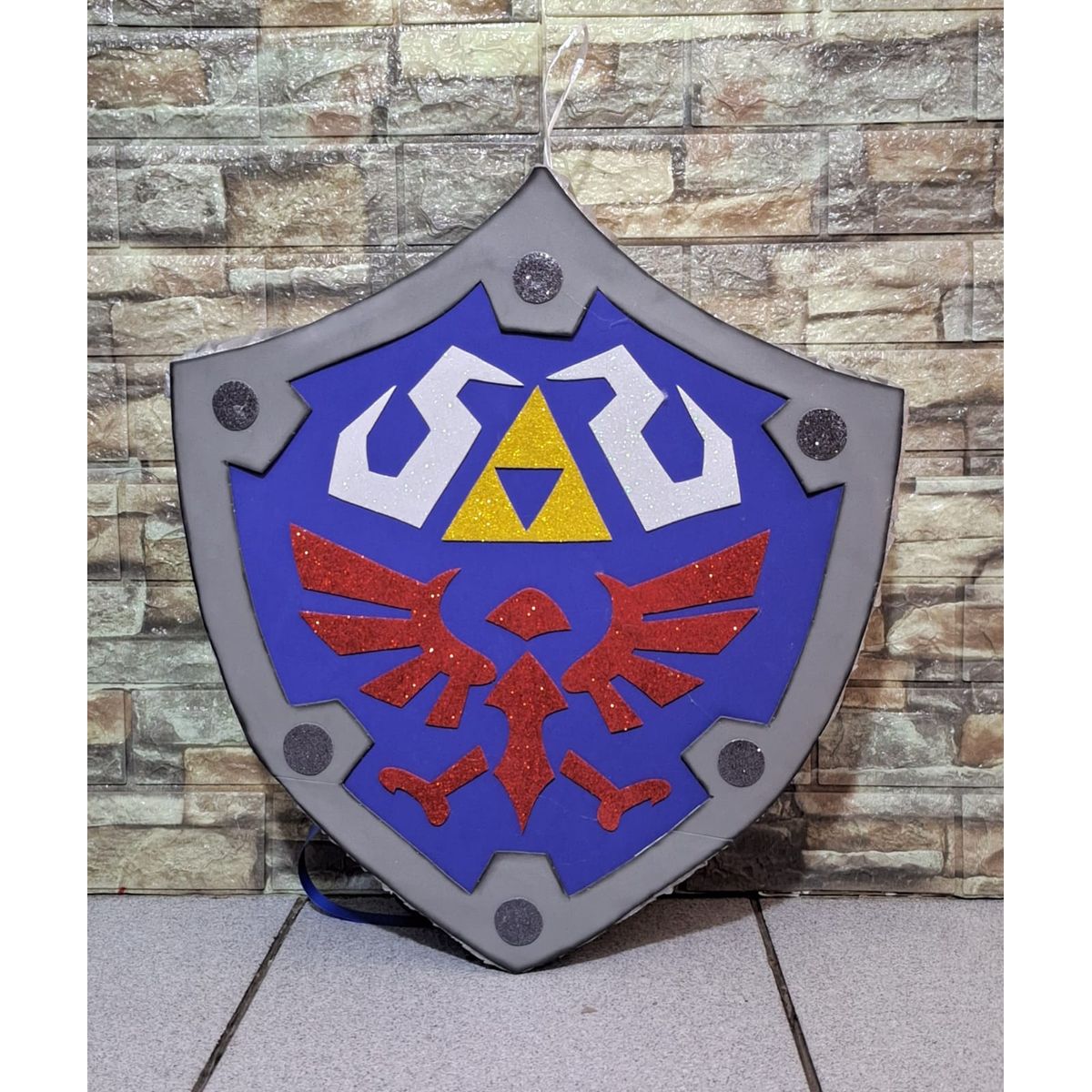 GENERICO - Piñata escudo Zelda de 50cm