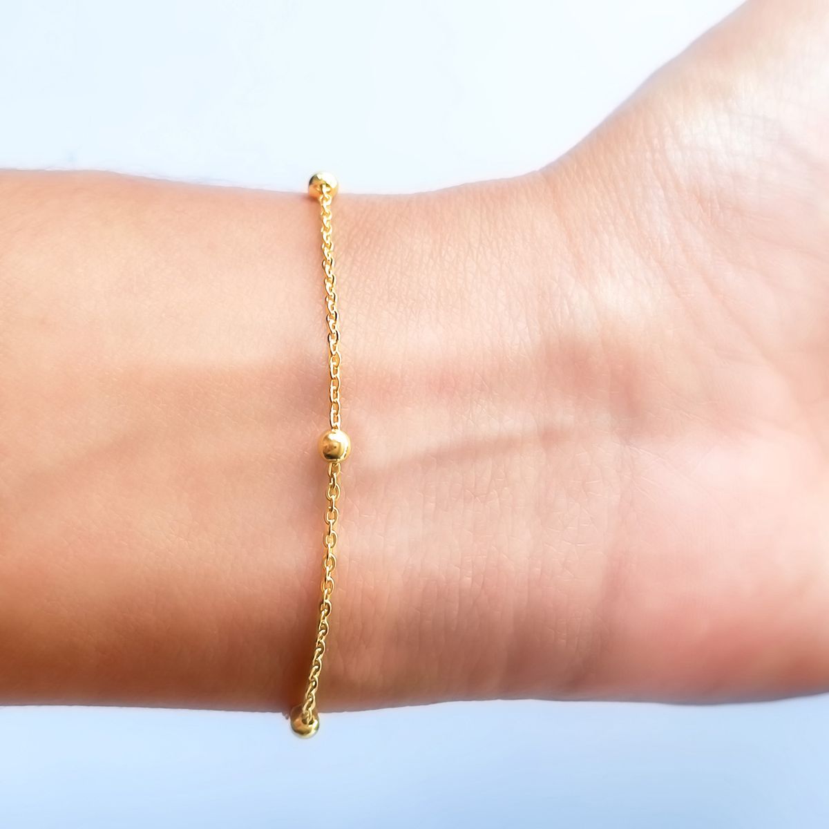 COGGIOLA - Pulsera 5 Bolitas Enchapado Oro 18K