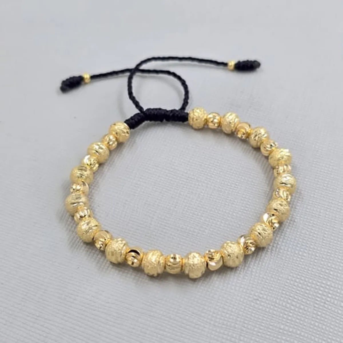 GENERICO - Pulsera Tejida Negra Balin Oro Laminado 18k