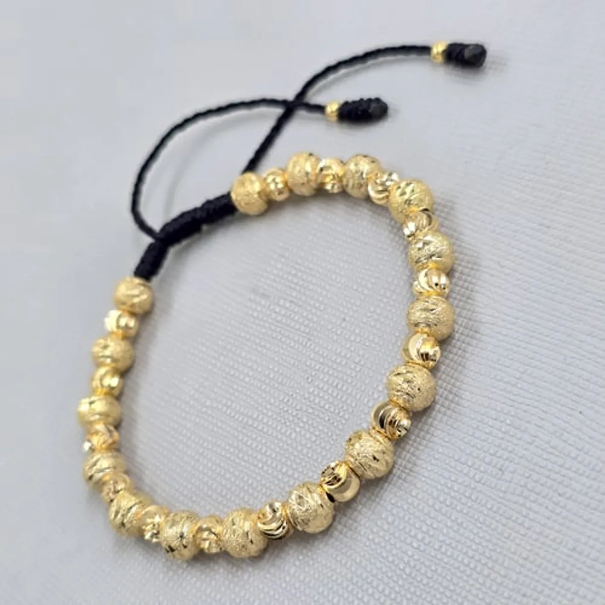 GENERICO - Pulsera Tejida Negra Balin Oro Laminado 18k