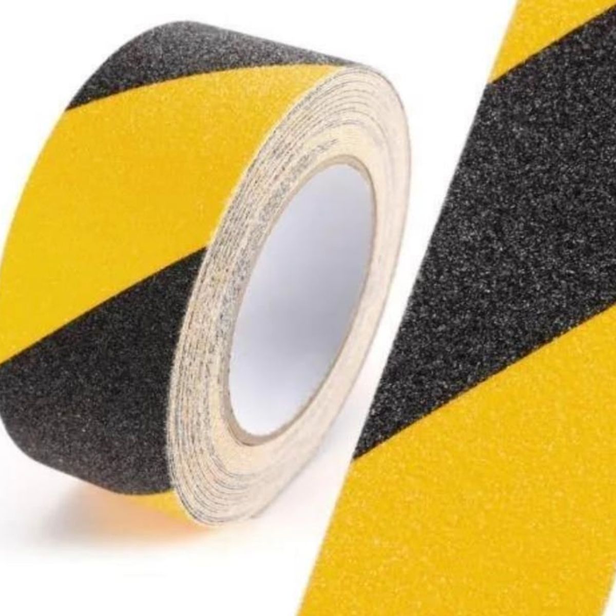 GENERICO - CINTA DELIMITADORA AMARILLONEGRO 10MTS ANTIDESLIZANTE