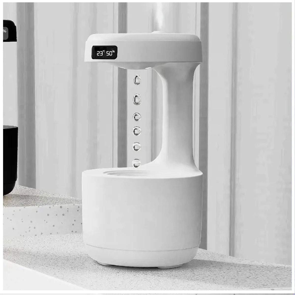 STARTECHOFFICE - Humidificador Antigravedad Reloj, Luz Cálida y Capacidad de 600 ml Recargable Iluminación LED