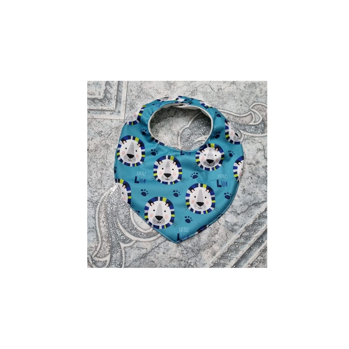 EL ESPACIO DE TOMMY - Babero impermeable diseño León