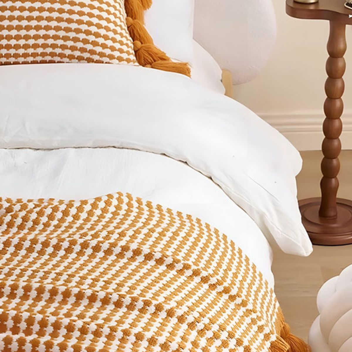 GENERICO - MANTA PIECERA CON POMPONES PARA DECORAR