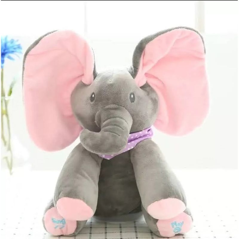 GENERICO - Elefante musical mueve las orejas mira un libro canta toca