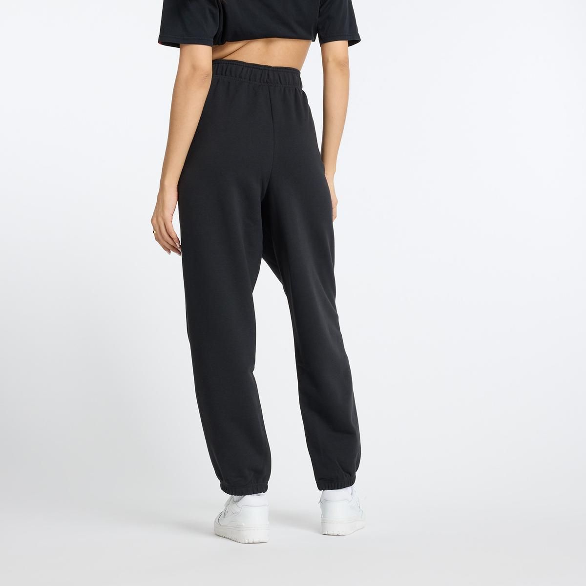 NEW BALANCE - Pantalón Jogger Lifestyle Mujer New Balance Negro