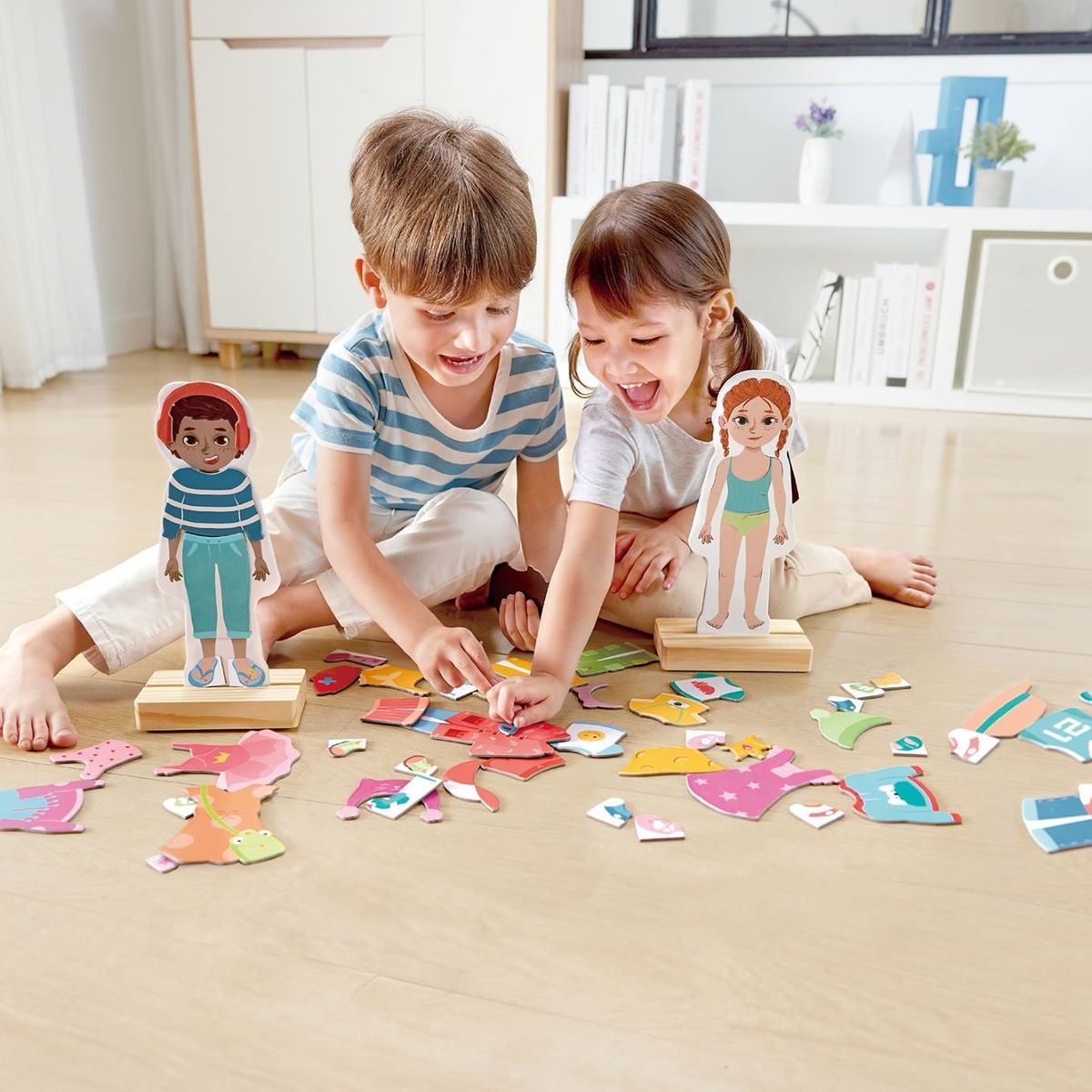 HAPE - Rompecabezas magnético de vestir Hape