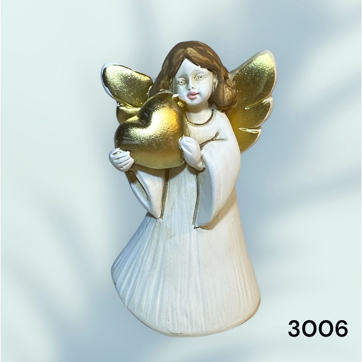 GENERICO - Estatua de Angelito sosteniendo corazón en polyresina