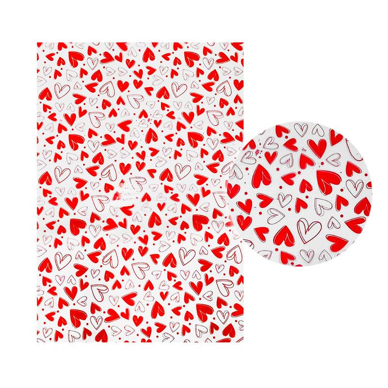 GENERICO - PAPEL CELOFAN 25C 70X100 CORAZONES CHICOS X50UNI