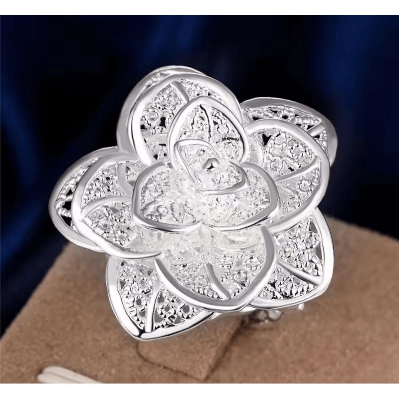 GENERICO - Anillo Ajustable Rosa plateado.-