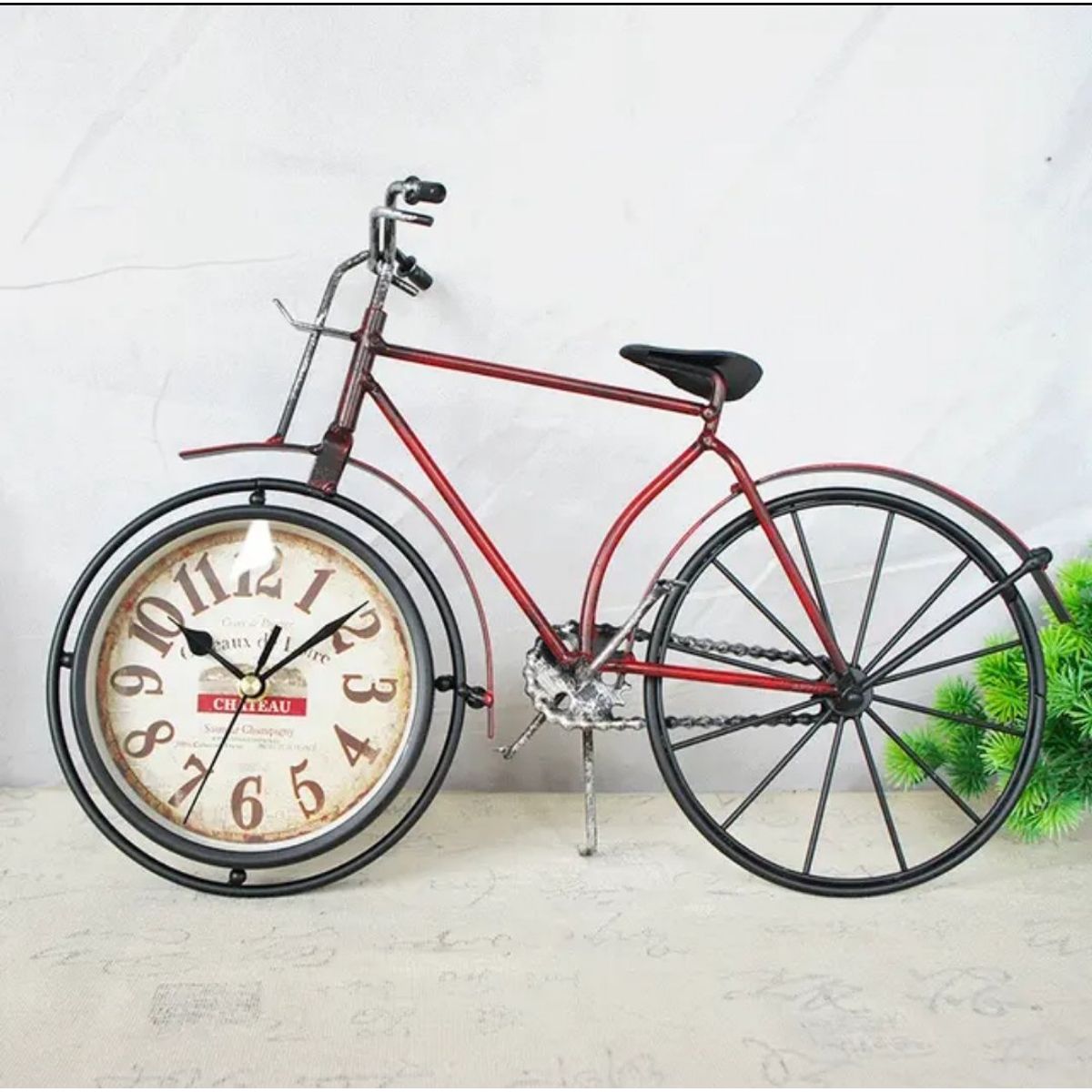 GENERICO - RELOJ VINTAGE SOBRE MESA MODELO BICICLETA ROJA  RETRO METAL