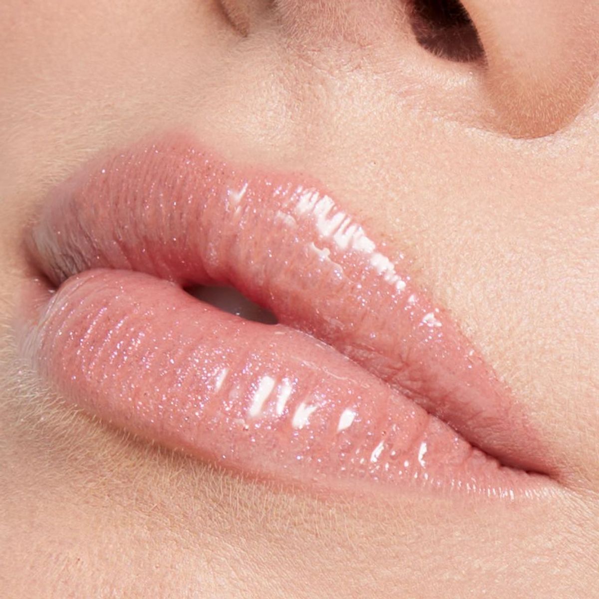 REM BEAUTY - Brillo Labial Voluminizador 7 rings 8 ml Rem Beauty