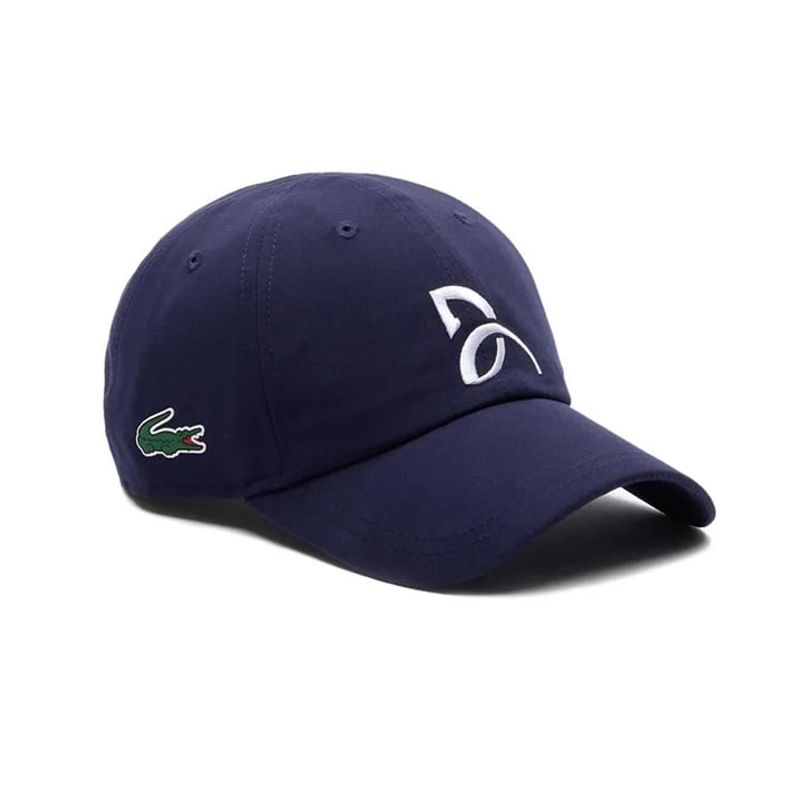 LACOSTE - Gorro Lacoste Novak Djokovic Azul Marino Tenis Padel