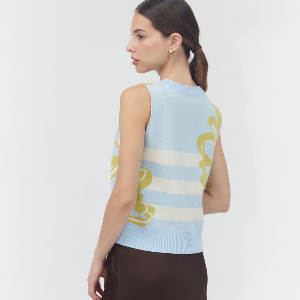 GUINDA - Sweater sin mangas estampado Kira Guinda