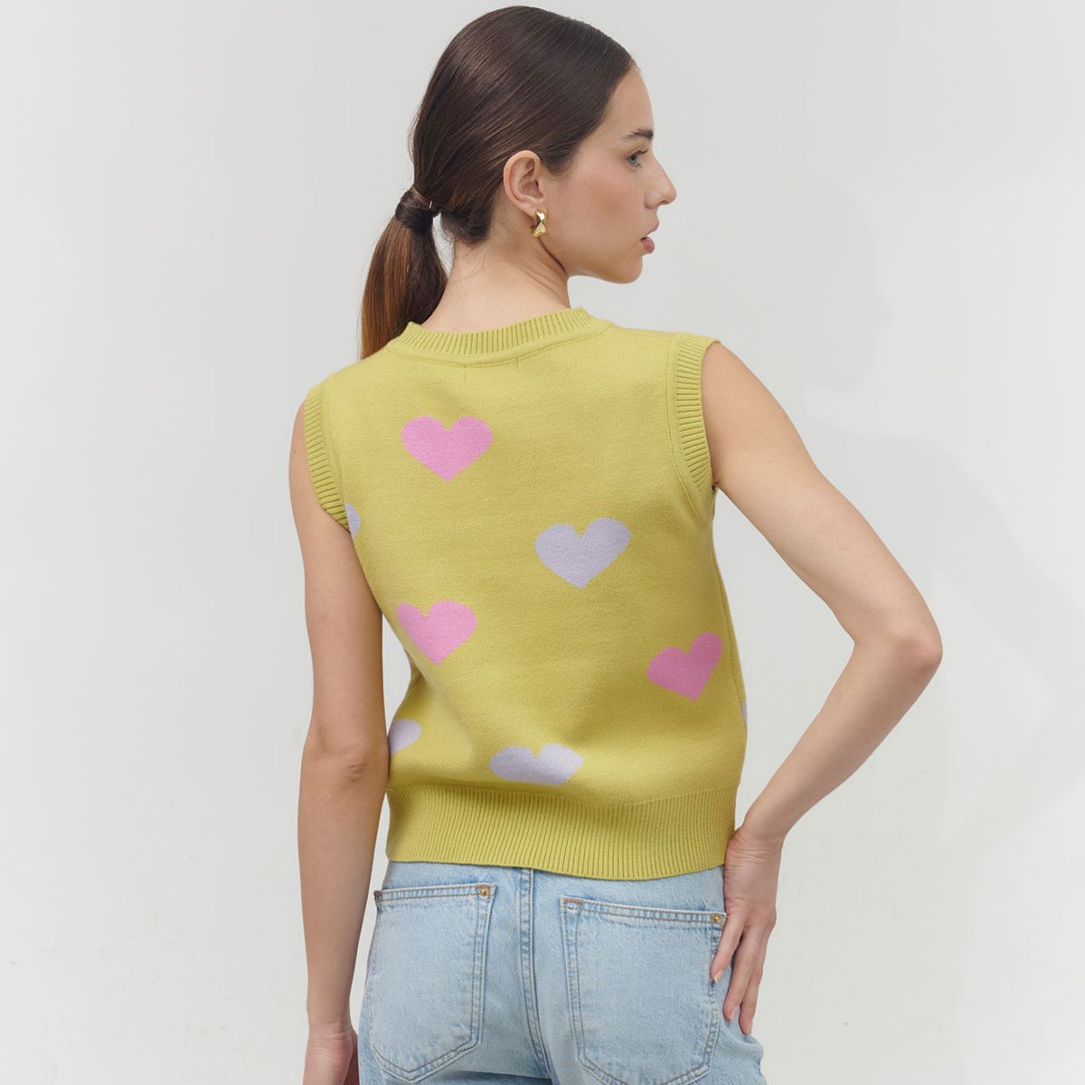 GUINDA - Sweater sin mangas estampado corazón Nala Guinda