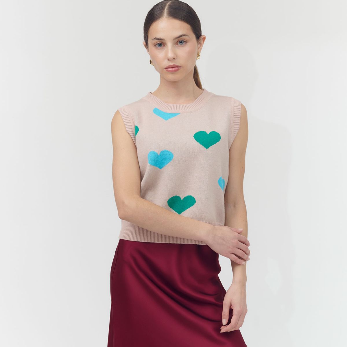 GUINDA - Sweater sin mangas estampado corazón Nala Guinda