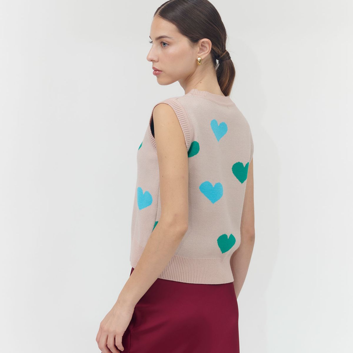 GUINDA - Sweater sin mangas estampado corazón Nala Guinda