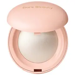 RARE BEAUTY - Iluminador en Polvo Positive Light en Enlighten -