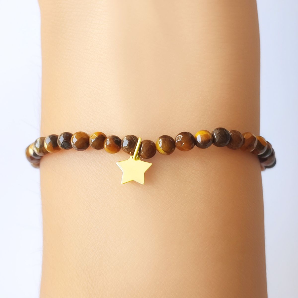 COGGIOLA - Pulsera Ojo De Tigre 4mm Estrella Enchapado Oro 18K Elásticada