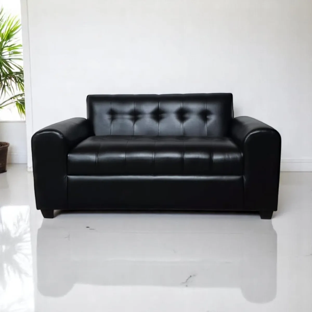 DISEÑOS VALESTRINI - SOFA TRES CUERPOS BRAZO REDONDO ECOCUERO NEGRO.