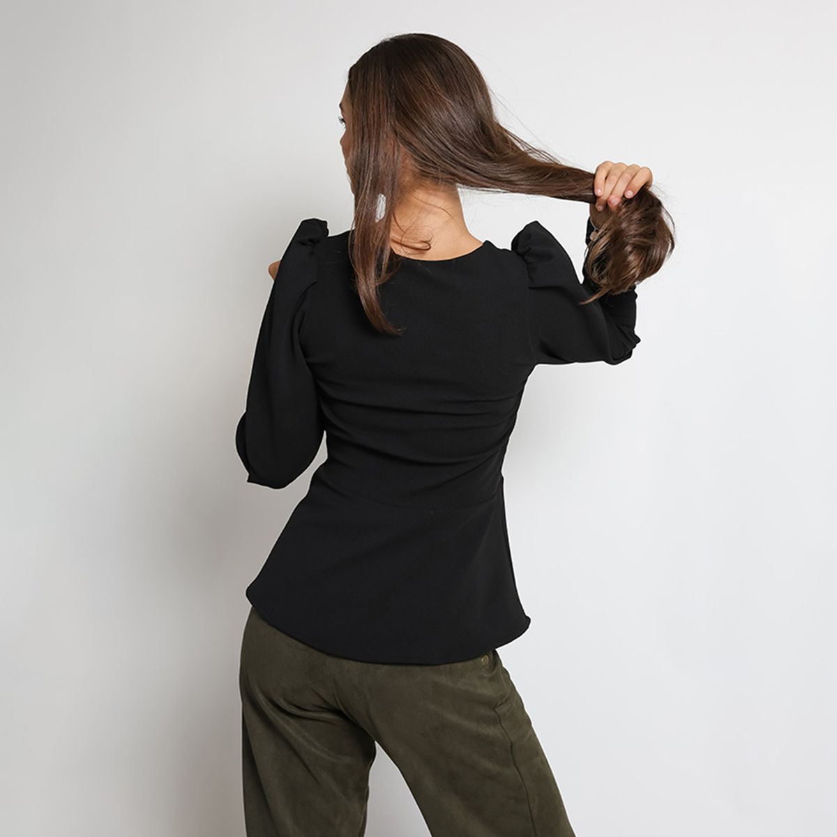 NATALIA SEGUEL - Polera Peplum Negro Natalia Seguel