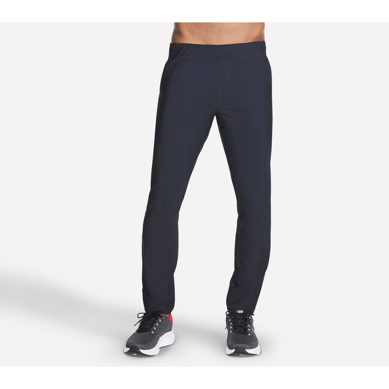 SKECHERS - Pantalón de Buzo Hombre Gostretch Tapered Negro Skechers