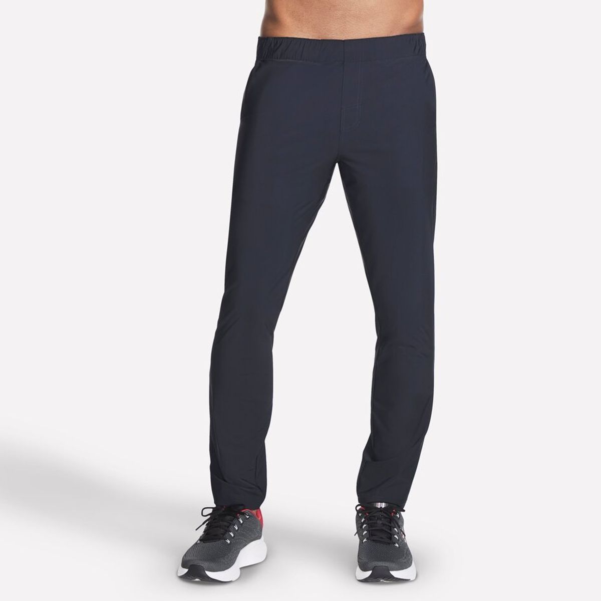 SKECHERS - Pantalón de Buzo Hombre Gostretch Tapered Negro Skechers