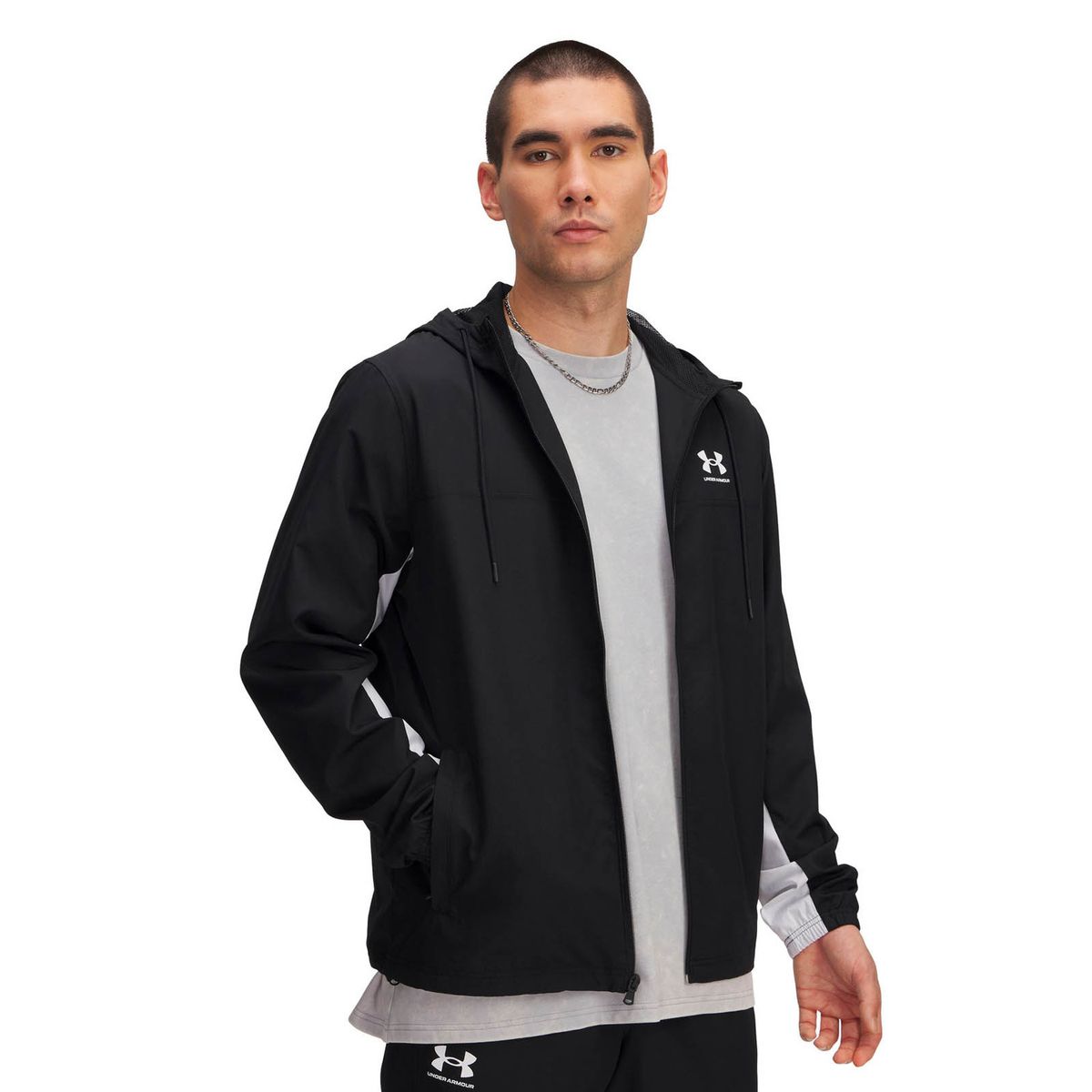 UNDER ARMOUR - Cortaviento Lifestyle para hombre Rival Woven Negro UNDER ARMOUR