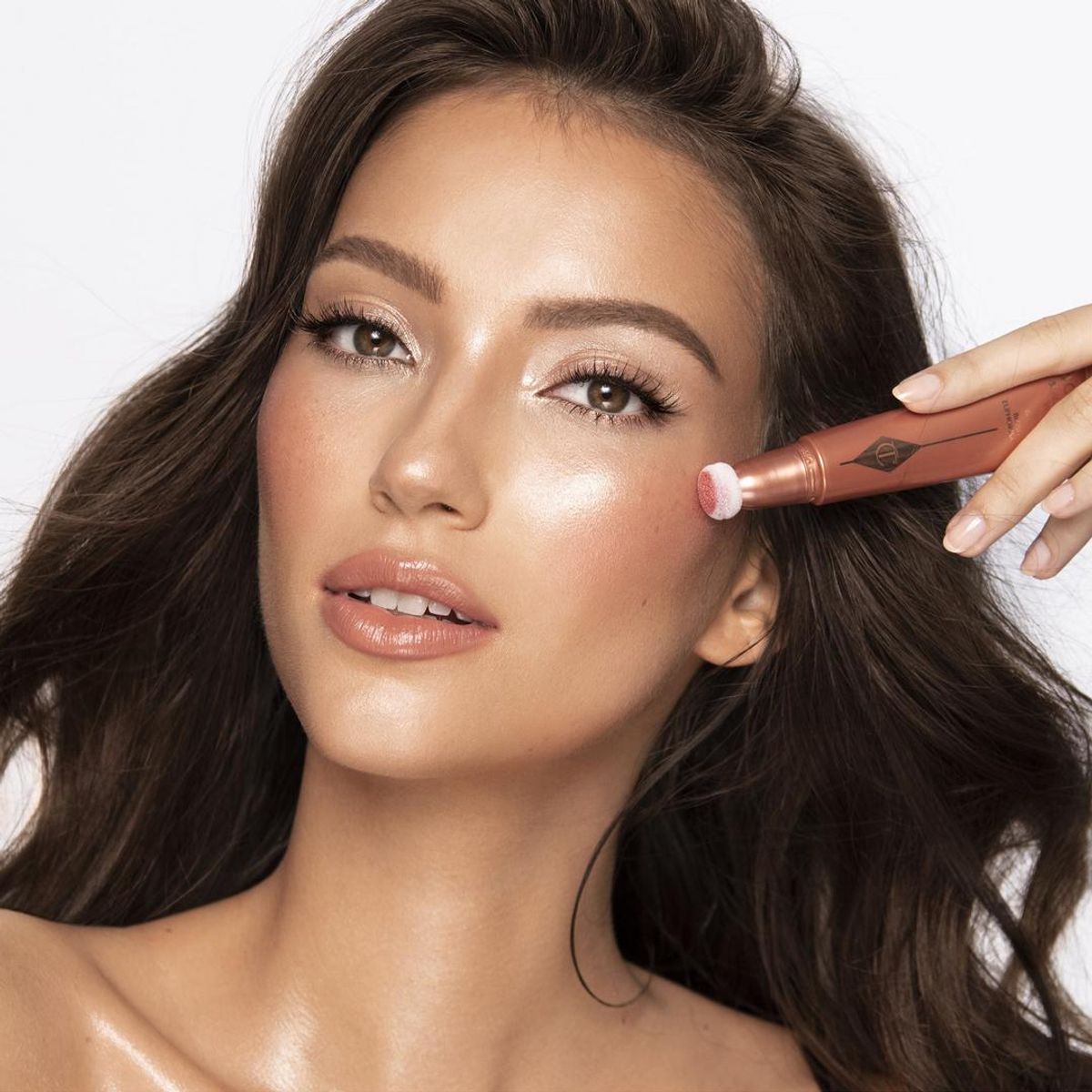 CHARLOTTE TILBURY - Iluminador Beauty Wand Peachgasm 12ml Charlotte Tilbury