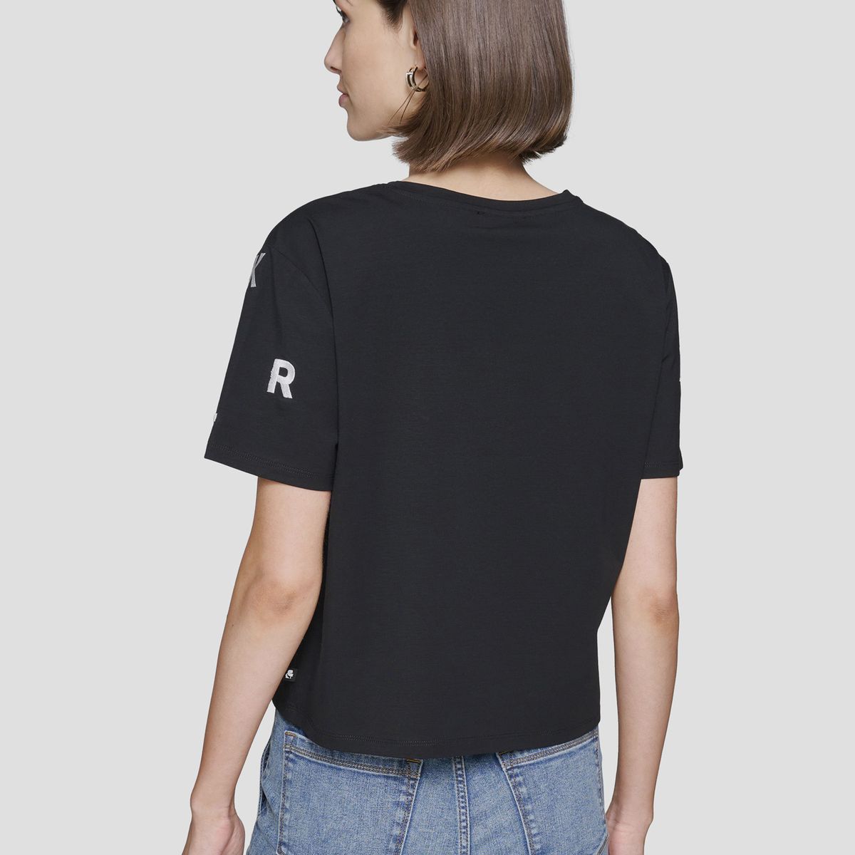 KARL LAGERFELD - Polera con letras dispersas tejidas