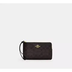 COACH - A large signature brand printed artificial leather clutch CZ277
