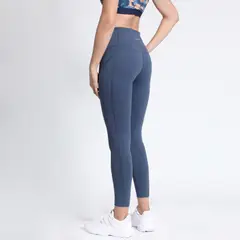 KANNU - Calza Larga Lisa Con Bolsillo Mujer