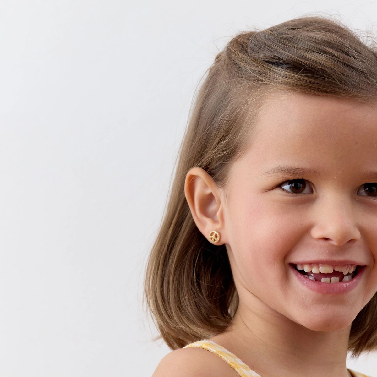 TIANA JOYAS - Aros de Símbolo de la Paz con Circones de Plata 925 y baño en Oro 18k